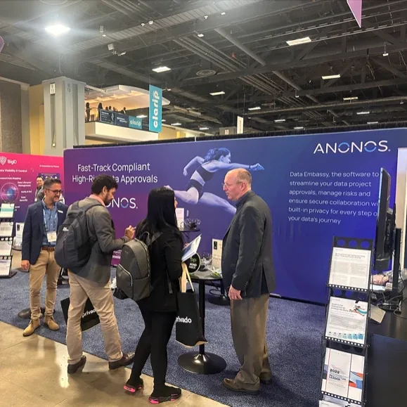 Attendees engaging with the Anonos Data Embassy booth at a major conference.