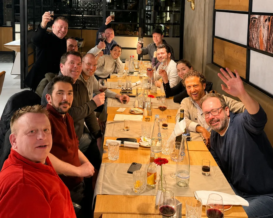 The Anonos team raising glasses in celebration.